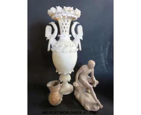 A large Victorian parian vase together with a terracotta statue of a youth sitting on a rock and an Inca-style vase