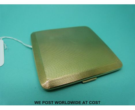 A hallmarked 9ct gold cigarette case with engine turned decoration (80g) 