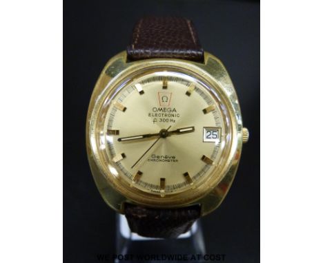Omega Electronic F300 Hz gold plated gentleman's chronometer wristwatch with date aperture, luminous hands and gold baton mar