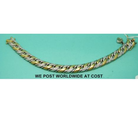 A Chopard 18ct bi-coloured gold bracelet with alternate links set with diamonds (82g) 