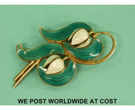 A Norwegian silver and enamel brooch in the form of lily of the valley, stamped to the back 'Made in Norway Sterling 925S'. 