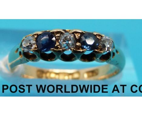 An 18ct gold ring, B'ham 1892, set with diamonds and sapphires (size K) 