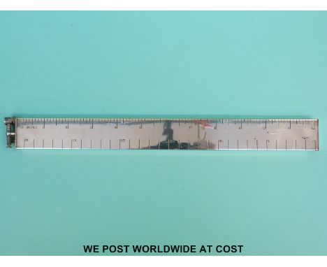A Dunhill 12inch silver plated lighter formed as a ruler