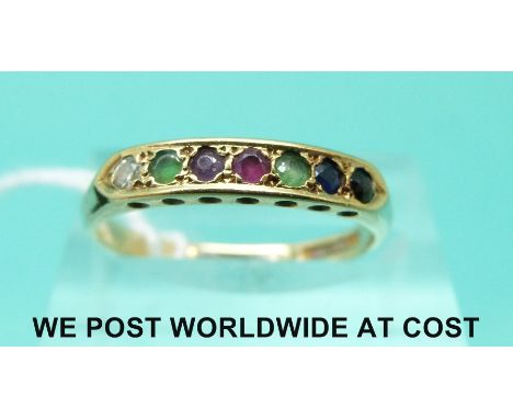 An 18ct gold ring set with a diamond, emerald, sapphire, ruby, garnet and jet (size N)