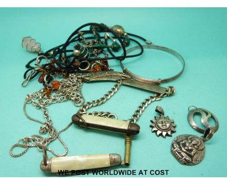 A hallmarked silver bangle, silver pendants, malachite necklace, silver bracelet etc 