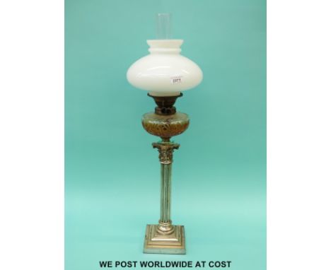 A Corinthian column oil lamp with cut glass reservoir