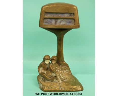 An Arts & Crafts bronze or brass electric lamp in the form of a tree with two figures beneath signed verso P. Tereszczuk (32c