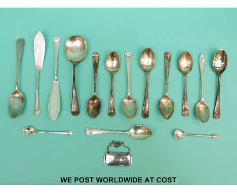 A quantity of hallmarked teaspoons, bottle ticket, butter knife etc (183g)