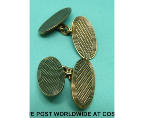 A pair of 9ct gold cufflinks with engine turned decoration (5.9g)