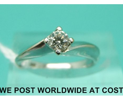 An 18ct white gold ring set with a diamond of approximately 0.3ct (size J)