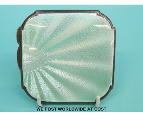 A J W Benson Art Deco hallmarked silver compact with engine turned back and aqua guilloche enamel front, London 1933, width 8