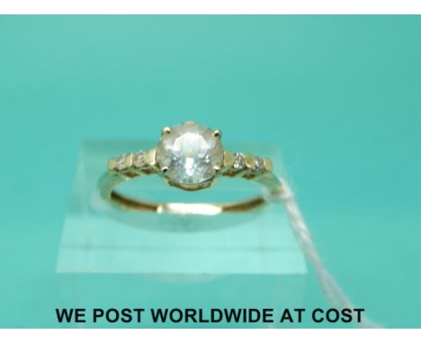 A 9ct gold ring set with cubic zirconia and diamonds (size N)