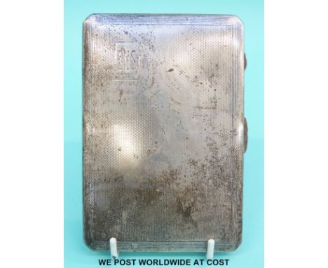 A hallmarked silver cigarette case with engine turned decoration (201g)