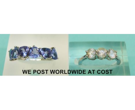 Two 9ct white gold rings, one set with amethyst, the other with zircon (3.9g)