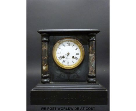 A black slate mantel clock with 'Benson, Ludgate Hill' to face, striking on a bell and JWB impressed to movement 