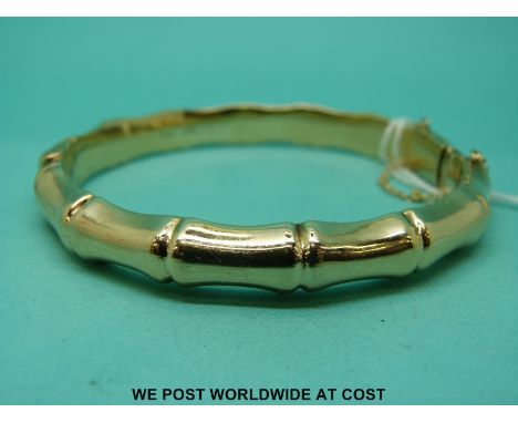 A 9ct gold bangle of bamboo style (11.7g)