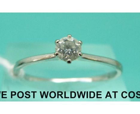 An 18ct white gold ring set with a 0.33ct diamond marked Candadian Ice, with box and certificate (size Q)