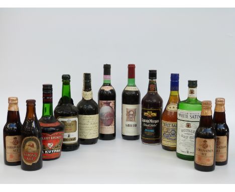 A quantity of bottles of alcohol to include; De Kuyper cherry brandy, Berisford sherry, White Satin gin, Captain Morgan rum, 