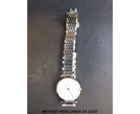 Longines La Grande Classic ladies wristwatch with black hands and Roman numerals and engine turned case, on stainless steel b