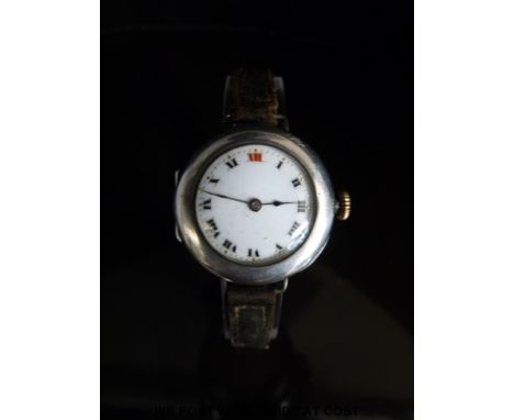 Rolex silver ladies wristwatch with Roman numerals and gilt markers to the white enamel face, on black leather strap, case di