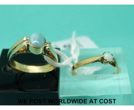 A yellow metal reversible ring marked 14k set with a blue stone to one side and a red stone to other (size M) and a 9ct gold 