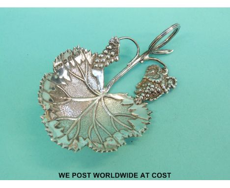 A William IV hallmarked silver vine leaf caddy spoon, Birmingham 1834 maker Taylor & Perry
