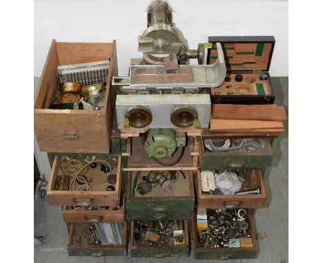A WOOD CHEST OF DRAWERS WITH BRASS CUP HANDLES CONTAINING MISCELLANEOUS CLOCK AND WATCHMAKER'S TOOLS, ETC., 87CM LCondition r