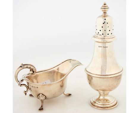 A GEORGE VI SILVER CASTER AND COVER, 18CM H, BY J. DIXON & SONS LTD., SHEFFIELD 1943 AND A SILVER SAUCE BOAT, BIRMINGHAM 1934