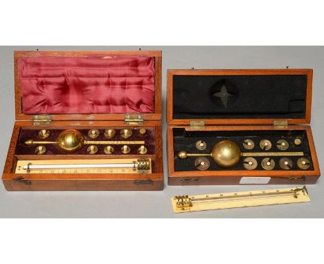 TWO VICTORIAN BRASS SIKES'S HYDROMETERS, COMPRISING FLOAT, WEIGHTS AND IVORY THERMOMETER, IN MAHOGANY CASE, 19.5 AND 20CM L, 