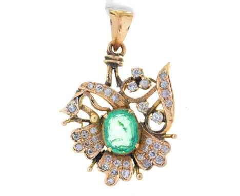 AN EMERALD AND DIAMOND PENDANT OF LEAFY FLORAL DESIGN, CENTRED BY A LARGER STEP CUT EMERALD IN GOLD, 21MM INCLUDING LOOP, 3.8
