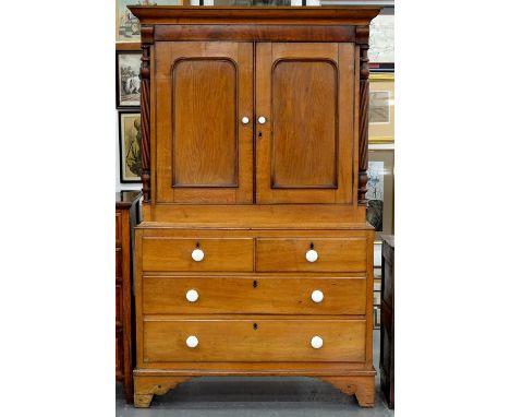 A VICTORIAN LIGHT OAK&nbsp; PRESS, POSSIBLY WELSH, MID 19TH C, THE UPPER PART FITTED WITH TRAYS, ONE WITH CONCAVE FRONT ENCLO
