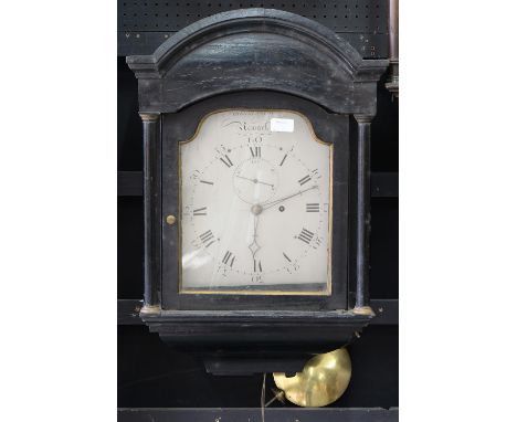 AN EBONISED HOODED WALL TIMEPIECE, THE SHAPED AND SILVERED DIAL WITH SUBSIDIARY SECONDS DIAL AND PIERCED HANDS, INSCRIBED TO 