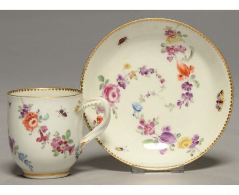 A WORCESTER COFFEE CUP AND SAUCER, OUTSIDE DECORATED, C1770, ATTRACTIVELY PAINTED IN THE ATELIER OF JAMES GILES WITH A SWIRLI