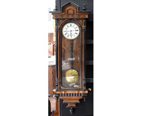 A WALNUT VIENNA WALL CLOCK, C1900, WITH EBONISED MOULDING, ENAMEL DIAL, PIERCED HANDS, AN ARCHITECTURAL CASE, 125CM H, PENDUL