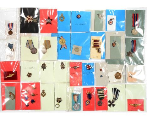 A COLLECTION OF CAMPAIGN AND COMMEMORATIVE MEDALS, BADGES, CLOTH AND OTHER OTHER INSIGNIA, INCLUDING BRITISH, AMERICAN AND SO