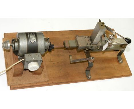 A BRASS AND FERROUS METAL CLOCKMAKER'S WHEEL CUTTING ENGINE, ON WOOD BASEBOARD, 35 X 72CMCondition report  Some surface rust.