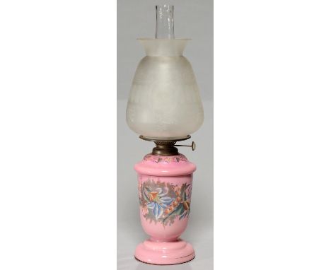 A VICTORIAN GLASS OIL LAMP C1890, OF OPAL GLASS CASED IN BLANMANGE PINK AND PAINTED WITH LILLIES, DETACHABLE FOUNT WITH BRASS