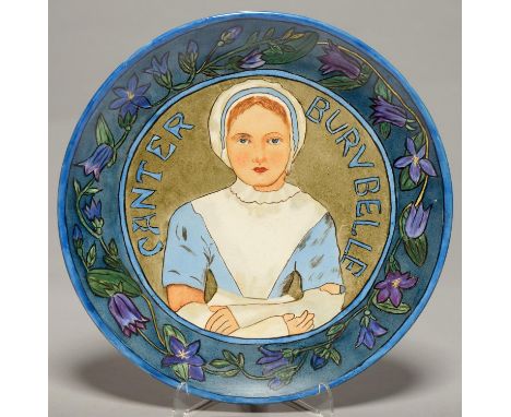 ART POTTERY. AN OUTSIDE DECORATED EARTHENWARE PLAQUE, C1905, PAINTED WITH A HALF LENGTH PORTRAIT OF A GIRL AND INSCRIBED CANT