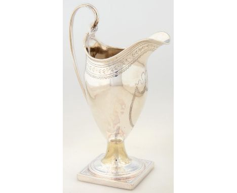 A GEORGE III HELMET SHAPED SILVER CREAM JUG, WITH ENGRAVED BORDER, REEDED HANDLE AND SQUARE FOOT, 15.5CM H, BY THOMAS SHEPHER