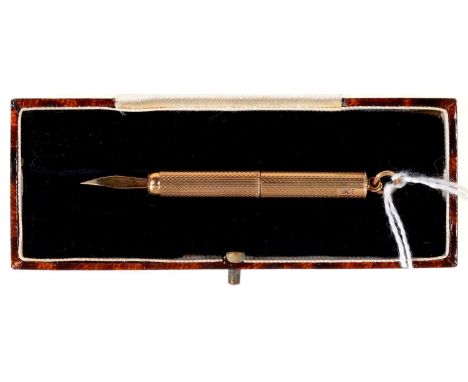 A GOLD RETRACTABLE TOOTHPICK, ENGINE TURNED BARREL, 46CM L, MARKED 9CTCondition report  Good condition