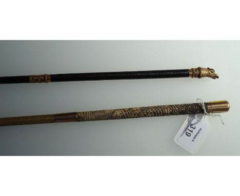A ladies Swaine and Adeney 9ct gold mounted snake skin handled riding crop, 82cm, together with a probably Palais Royale ladi