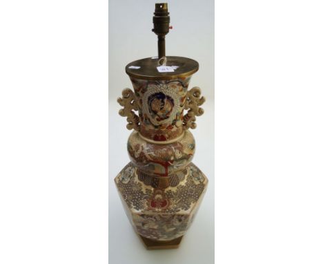 A Japanese Meiji period Satsuma table lamp/vase, with enamel decoration in the form of landscape and figural panels