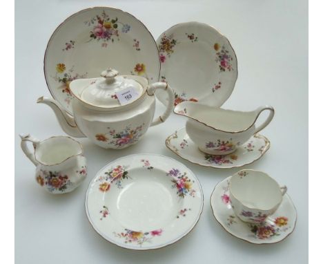 An extensive Royal Crown Derby 'Derby Posies dinner and tea service, comprising eight dinner plates, ten salad plates, ten te