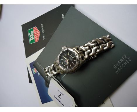 A lady's stainless steel Tag Heuer wristwatch, serial number Z69386., SEL model WG 1313-0 fitted with a Sport-Elegance bracel