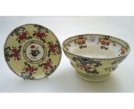 A Victorian Staffordshire bone china part tea set, with black transfer print decorated with yellow scale and pink flowers