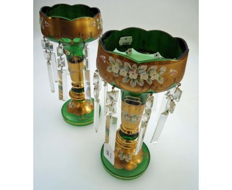 A pair of 20th century enamel and gilt green glass table lustres, with hanging drops, 31cm high