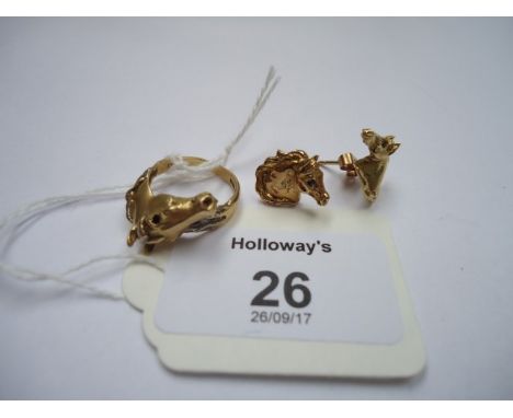 An 18ct gold equine ring, bi-coloured well modelled horse's head with sapphire set eye and a pair of earrings en suite