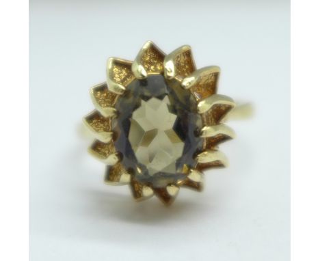 A 9ct gold and smoky quarty ring, 2.9g, N 