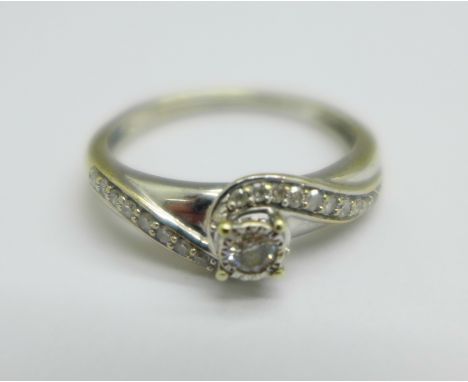 A 9ct white gold and diamond ring, 2.2g, L 