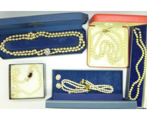 Five simulated pearl necklaces, boxed 